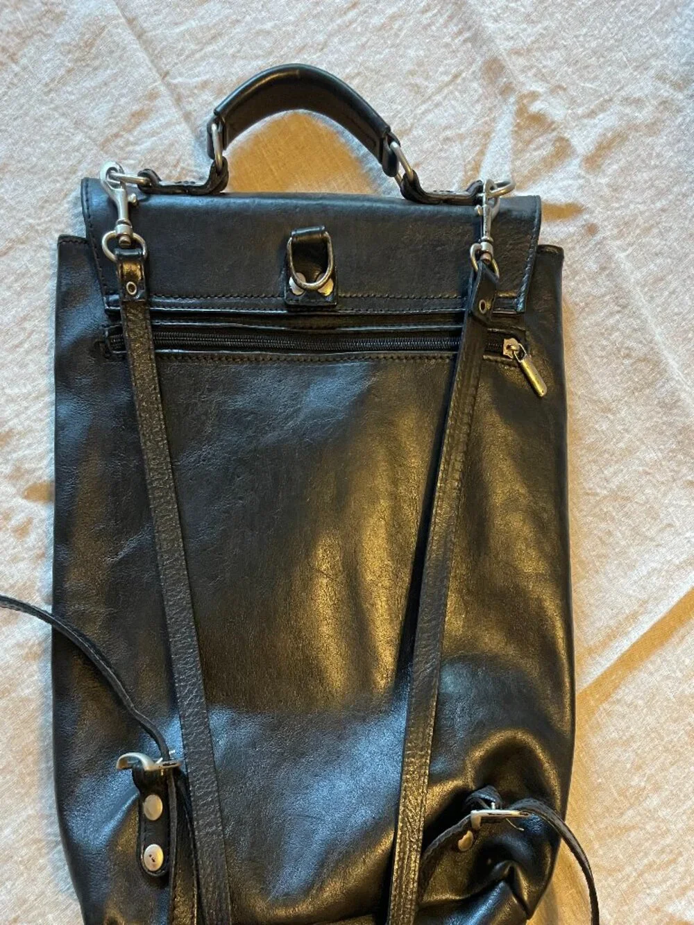 vintage black leather backpack
